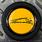 ” MOMO NIKI LAUDA YELLOW HORN BUTTON”/